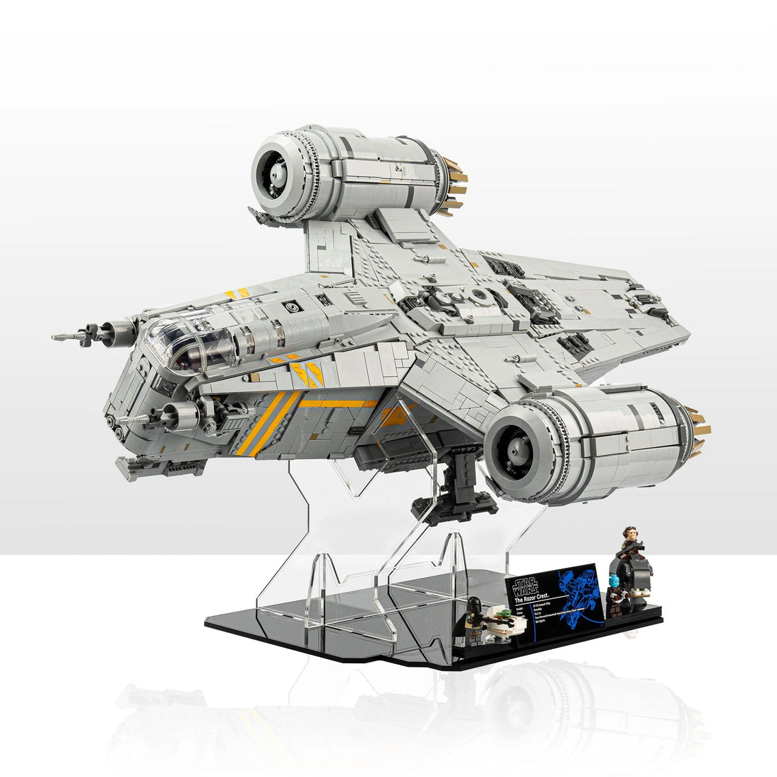 LEGO UCS Razor Crest 75331 raised on a clear stand with the cockpit, twin engines and a plaque visible