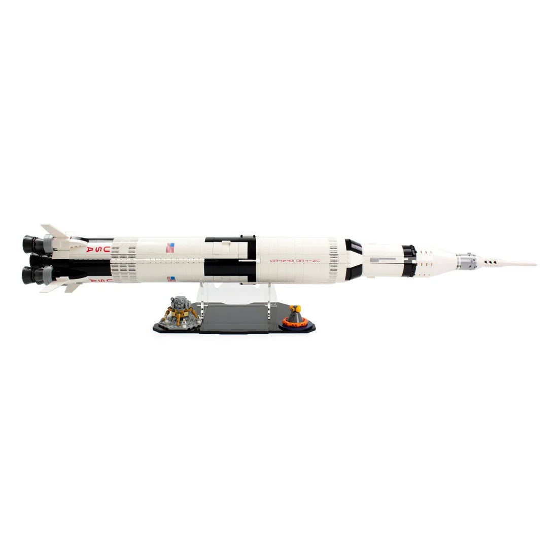 LEGO Saturn V 92176 displayed horizontally on an open tabletop stand
