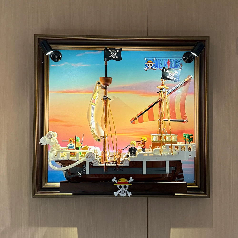 Going Merry wall display frame for LEGO 75639 with spotlights and a sunset backdrop