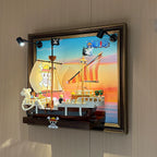 Side view of the Going Merry wall frame with spotlights and projecting display platform