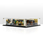 Low front angle of The Office 21336 display case with the completed office scene