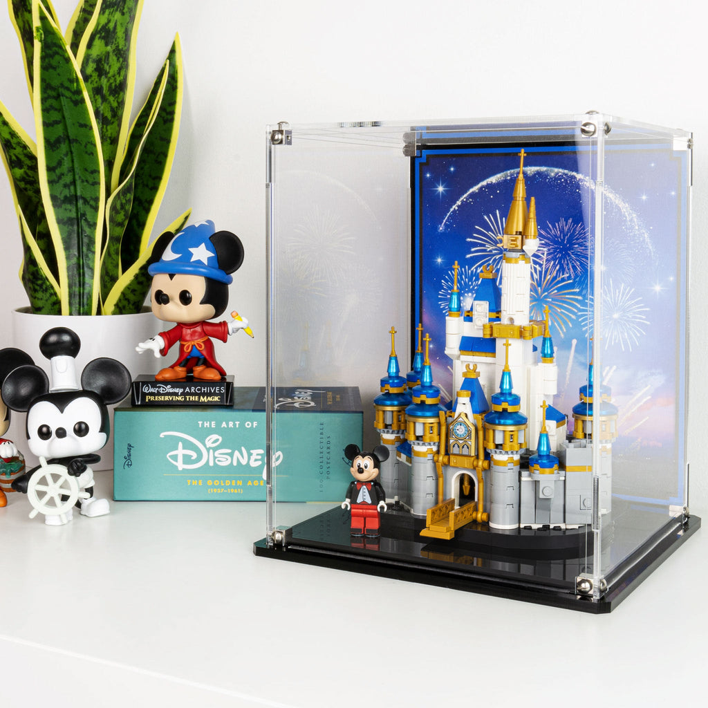 Mini Disney Castle 40478 display case arranged beside other Disney collectibles