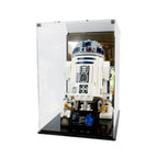Angled view of R2-D2 75308 and its display base inside the printed background case