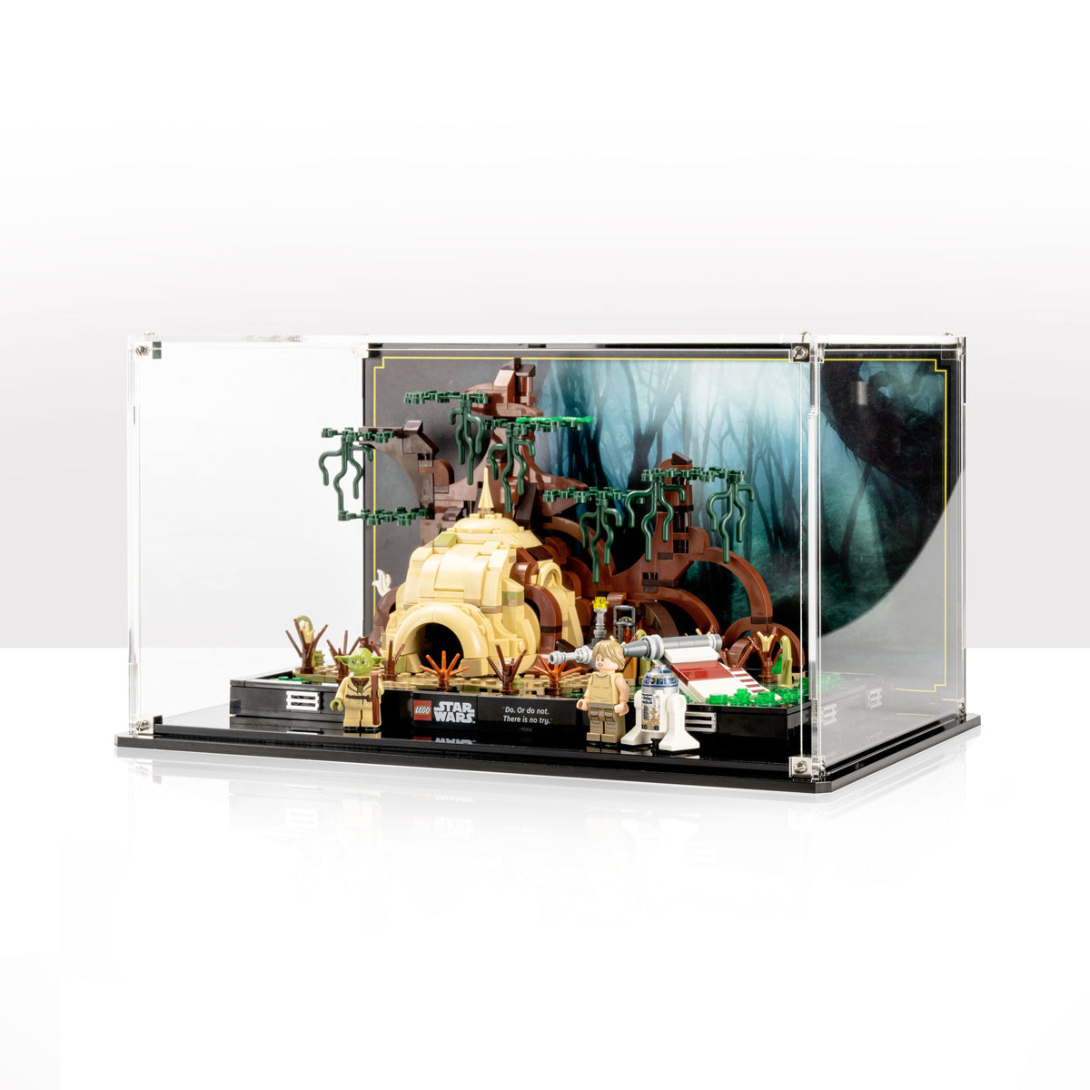 LEGO Dagobah Jedi Training Diorama 75330 in an acrylic case with a forest background
