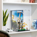 Tallneck 76989 display case arranged on a shelf beside gaming accessories