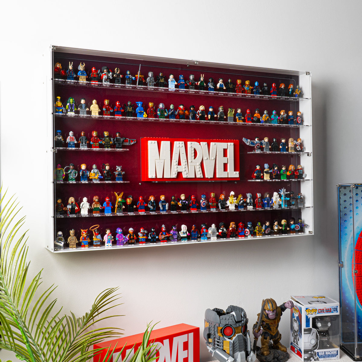 LEGO 76313 Marvel Logo & 124 Minifigures in the acrylic wall mounted display case, display view 2