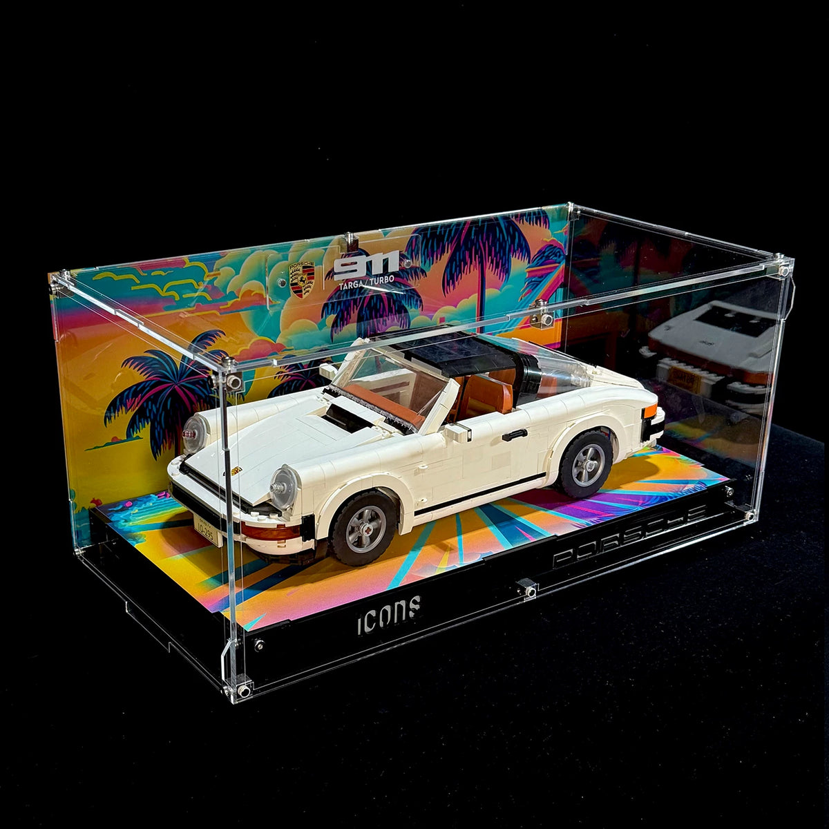 Complete printed-background display case with LEGO Porsche 911 10295, front three-quarter view