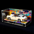 Printed-background display case with LEGO Porsche 911 10295, rear three-quarter view