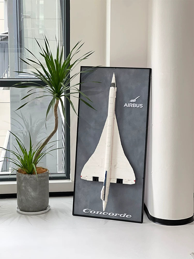 Full-length room view of the LEGO Concorde 10318 display frame with a gray background