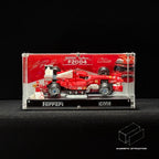 Front view of the LEGO 11375 acrylic display case on a dark background with magnetic closure illustration.