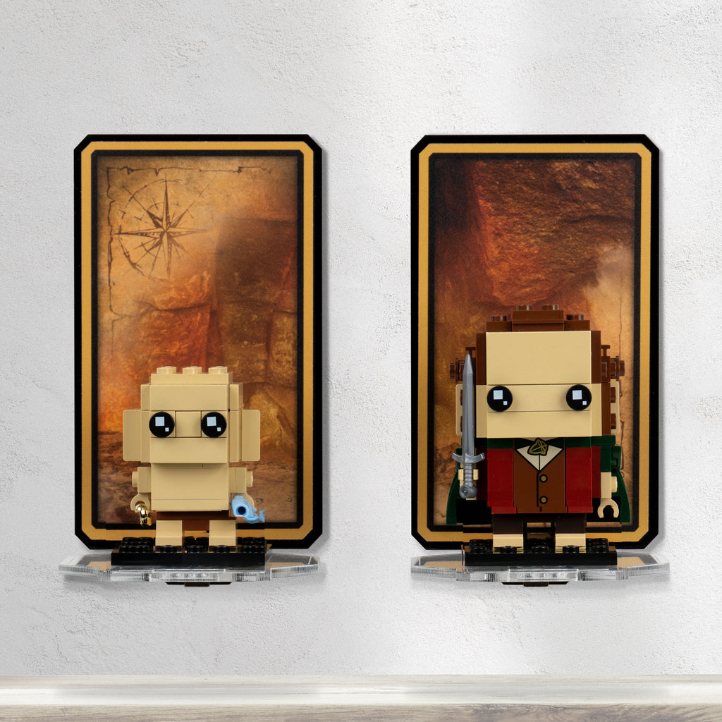Front view of Frodo and Gollum 40630 on two clear wall-mounted shelves with Mount Doom-inspired backgrounds.