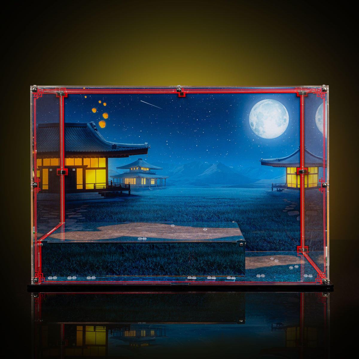 Empty acrylic display case for LEGO 80121 with a raised platform, red decorative borders and moonlit inn artwork.