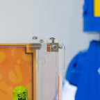 LEGO Minifigures Series 29 71052: close view of the desktop and wall display case construction or display arrangement.