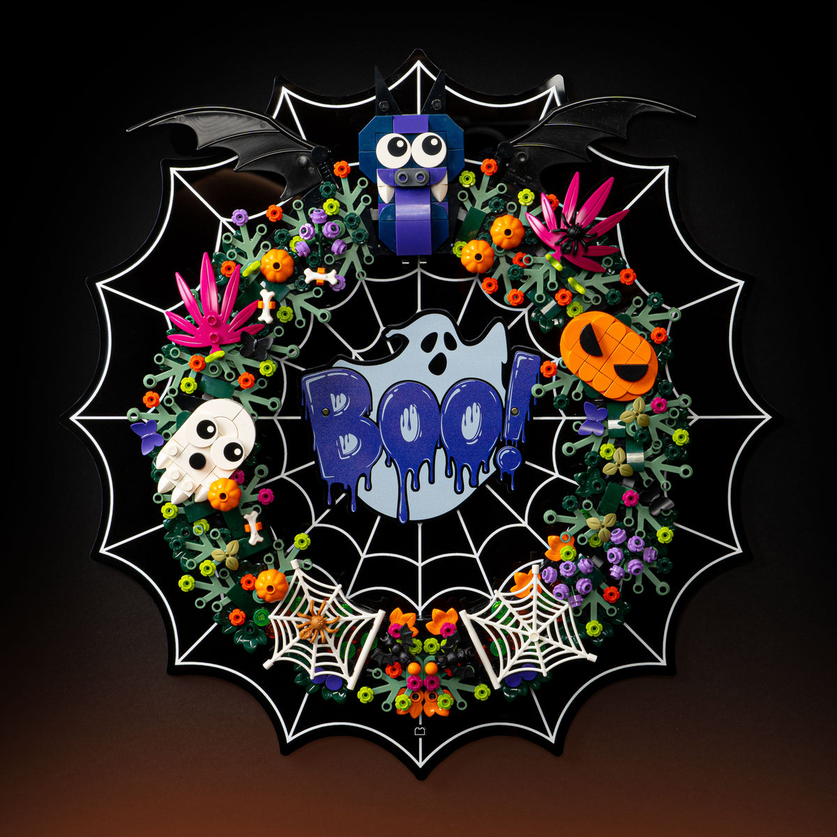 LEGO Halloween Wreath 40825: model and wall display stand shown together.