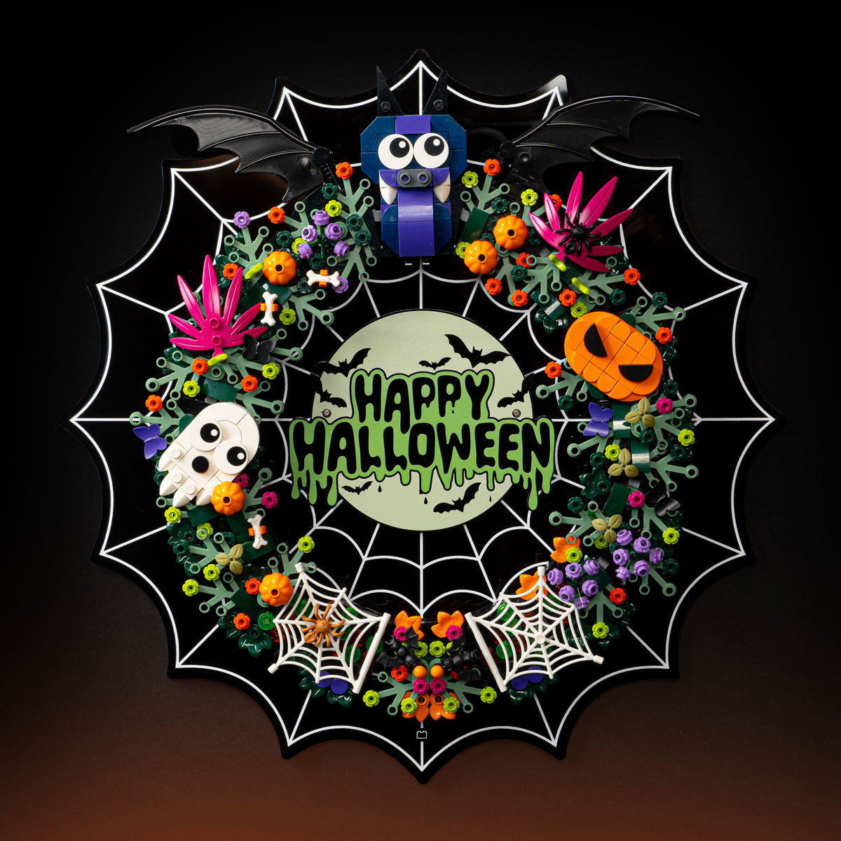 LEGO Halloween Wreath 40825: model and wall display stand shown together.