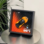 Single-car display frame compatible with LEGO 77257 - McLaren W1. Car and minifigures not included.