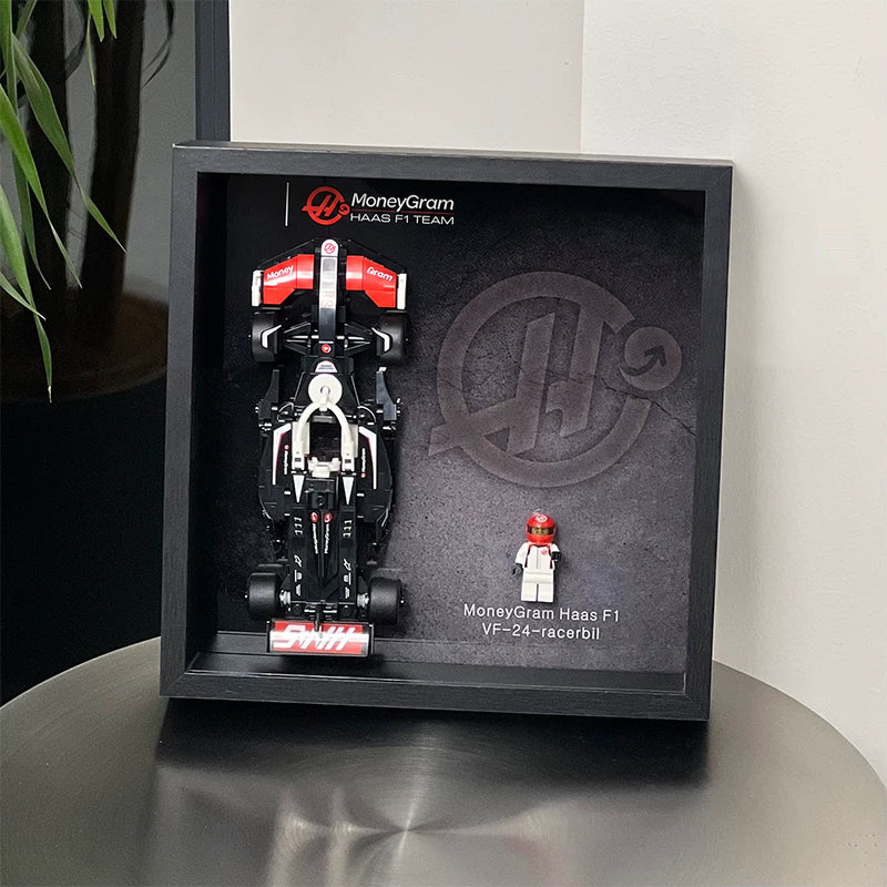 Single-car display frame compatible with LEGO 77250 - MoneyGram Haas VF-24. Car and minifigures not included.