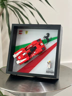 Single-car display frame compatible with LEGO 76906 - 1970 Ferrari 512 M. Car and minifigures not included.