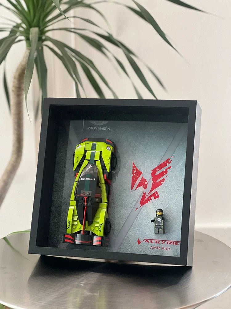 Single-car display frame compatible with LEGO 76910 - Aston Martin Valkyrie AMR Pro. Car and minifigures not included.