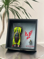 Single-car display frame compatible with LEGO 76910 - Aston Martin Valkyrie AMR Pro. Car and minifigures not included.