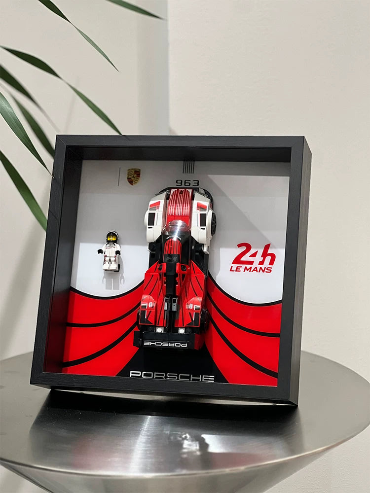 Single-car display frame compatible with LEGO 76916 - Porsche 963. Car and minifigures not included.