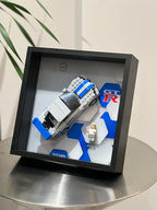 Single-car display frame compatible with LEGO 76917 - 2 Fast 2 Furious Nissan Skyline GT-R R34. Car and minifigures not included.