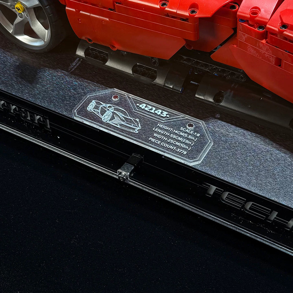 Angled acrylic display case for LEGO Ferrari Daytona SP3 (42143), display plaque close-up