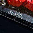 Angled acrylic display case for LEGO Ferrari Daytona SP3 (42143), display plaque close-up